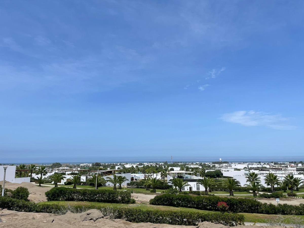 Se vende lote en Condominio Playa Coral, Asia - 1